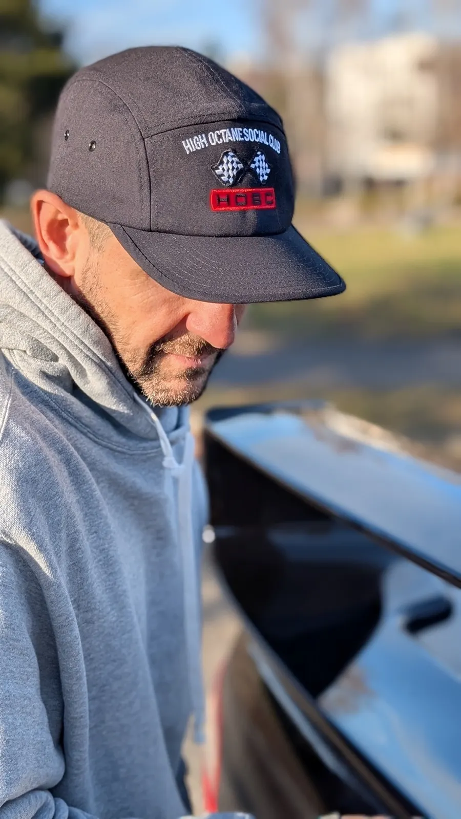 Five-Panel Cap worn, looking down at a black bonnet